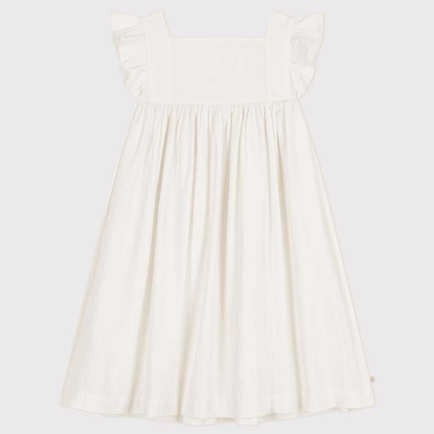 
Sleeveless dress from the Petit Bateau girls' clothing line in worked cotton. Feminine dress wit...