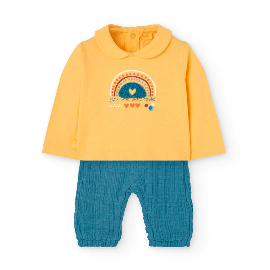 Complete two-piece set from the Girls' Clothing Line Boboli, with gauze pants and a solid color p...