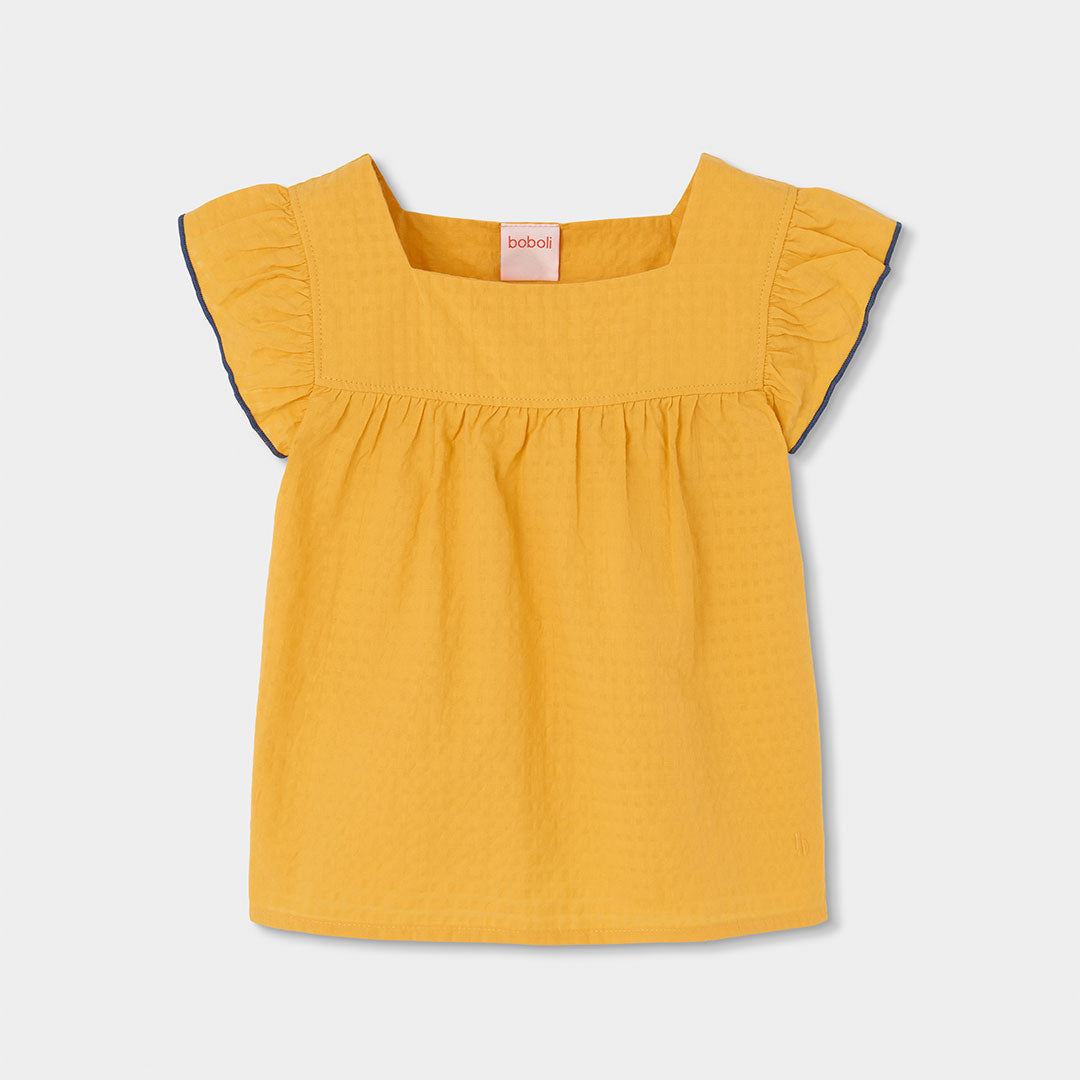 Blouse from the Children's Clothing Line Boboli, with ruffles on the straps and a flared solid co...