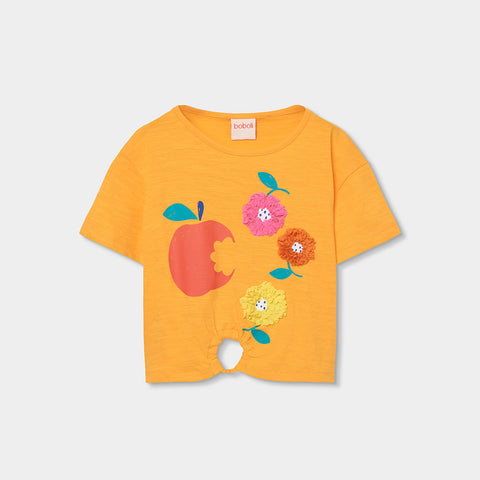 T-shirt corta gialla con stampa di mele e fiori colorati