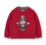 Maglione rosso per bambino con ricamo divertente sul davanti.