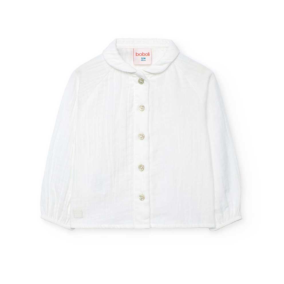 Shirt from the Boboli Girls' Clothing Line, with long sleeves and solid color.

Composition: 100%...