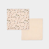 Coperta neonato beige con disegni di animali e alberi da un lato e lato interno soffice color crema