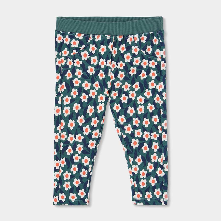 Questi pantaloni felpati con fantasia floreale portano allegria e comfort nelle giornate autunnal...