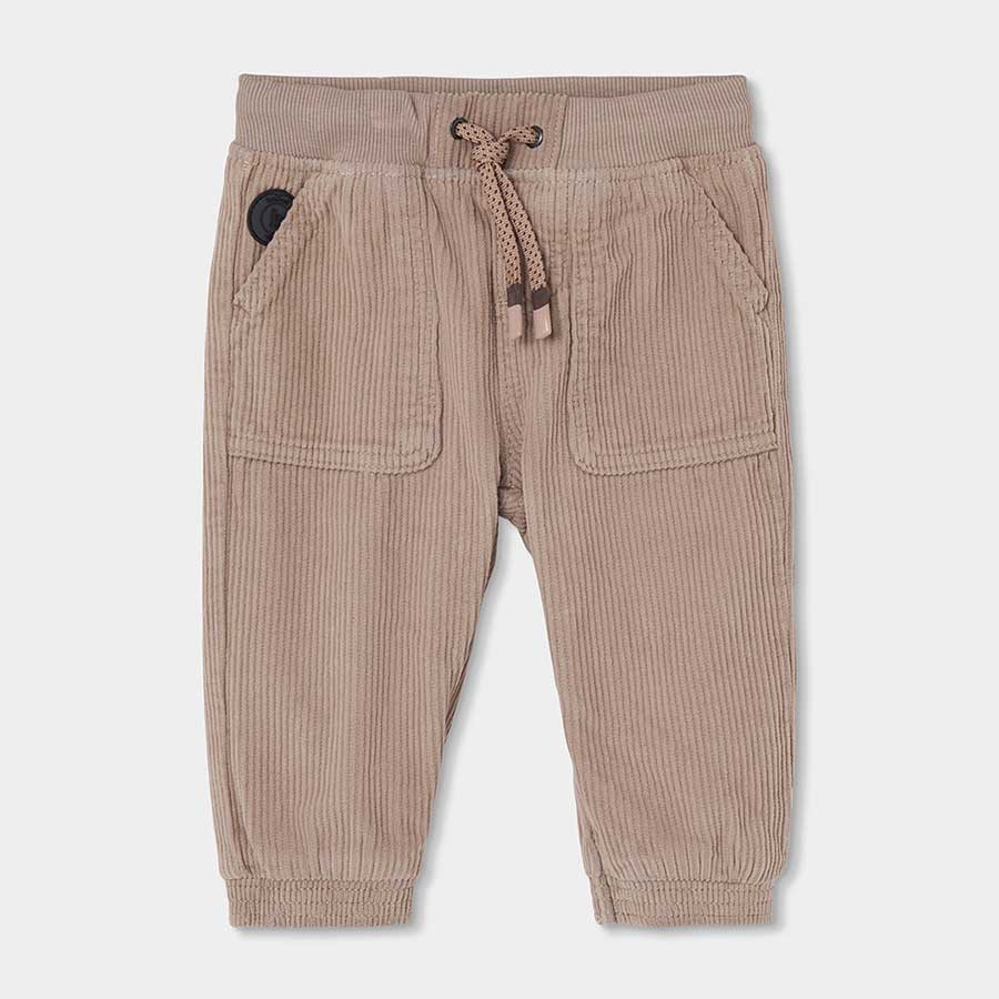 Pantaloni in velluto color beige con tasche e coulisse in vita per bambino