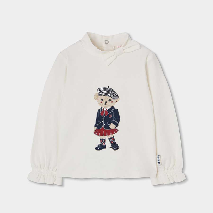 Scopri la maglia a maniche lunghe dal design dolce e raffinato, perfetta per le giornate fresche ...