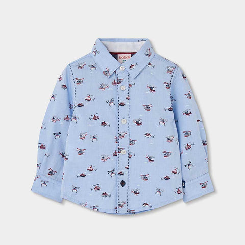 Camicia oxford azzurra con stampa di piccoli elicotteri rossi e bianchi, manica lunga e bottoni bianchi