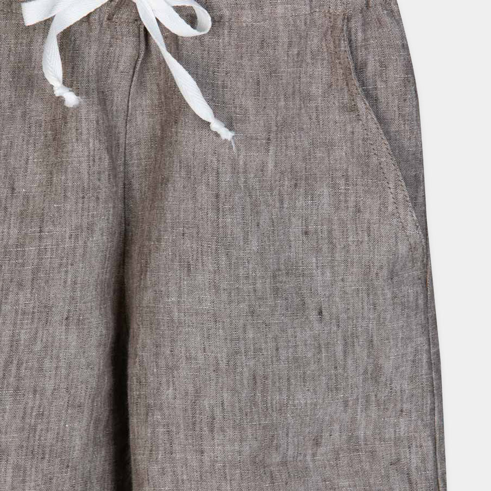 
Linen Bermuda shorts from the Lalalù Childrenswear Line, with elastic waistband and bow on the f...