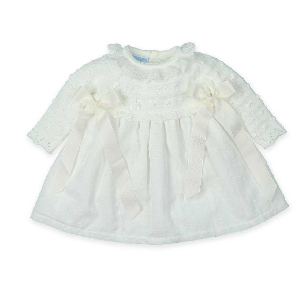 Questo abito combina delicatezza e stile, perfetto per i momenti speciali della tua bambina. Il c...