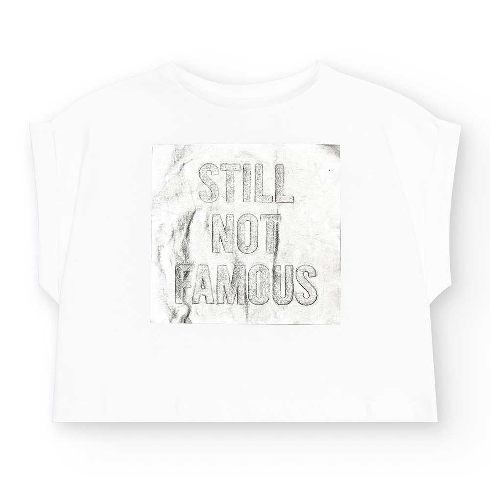 Nath Kids Girl's Clothing Line T-shirt, with a square pattern and embossed print on the front.
Co...