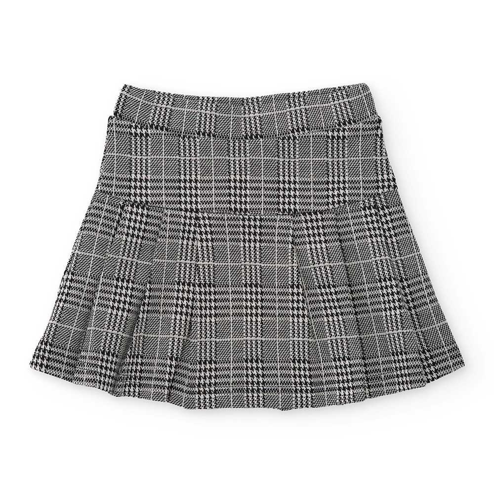 College-style skirt from the Nath Kids Girls' Clothing Line, with houndstooth pattern.

Compositi...