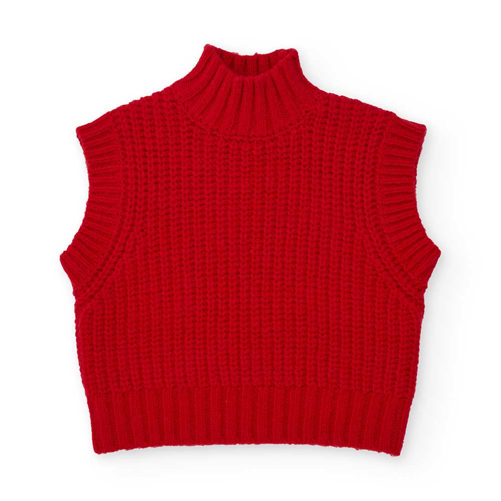 Knit vest from the Nath Kids girls' clothing line, with a mock neck and English rib knit.
Composi...