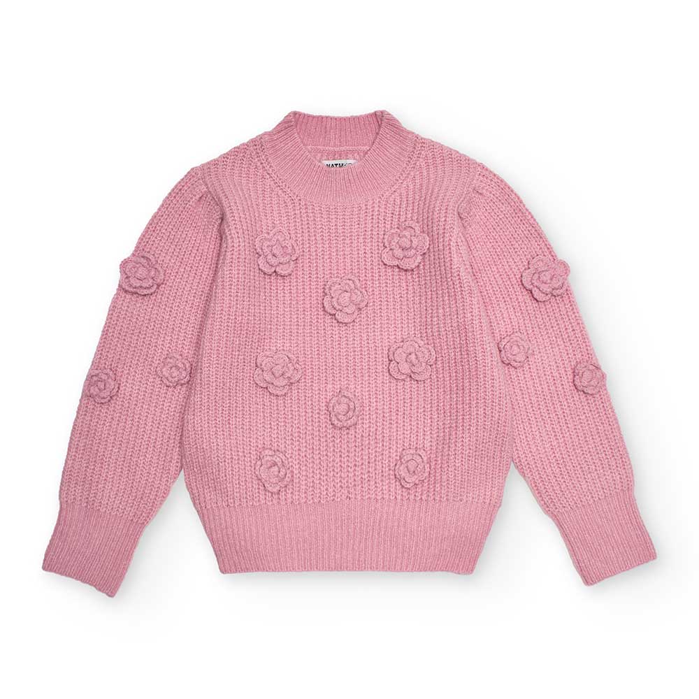 Sweater from the Nath Kids Girls' Clothing Line, with a mock neck and knitted appliqué flowers.
C...