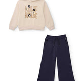 Tuta felpa composta da felpa beige con scritta e pantalone blu navy ampio con coulisse