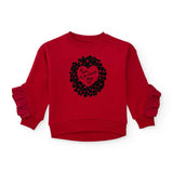 Felpa rossa con stampa cuore e fiori neri e rouches sulle maniche per bambina