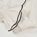 CAMICIA CON FIOCCO