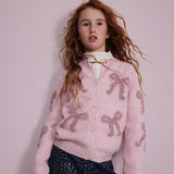 CARDIGAN CON FIOCCHI