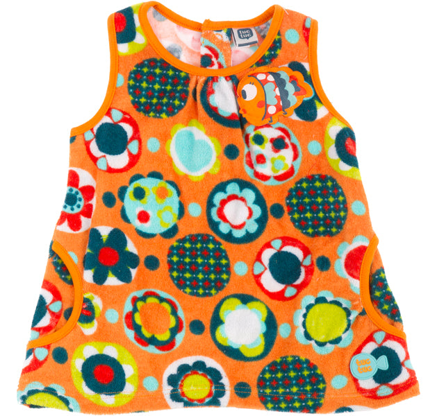 
  Sundresses from the Tuc Tuc girl's clothing line, in terry cloth, floral pattern
  on an orang...