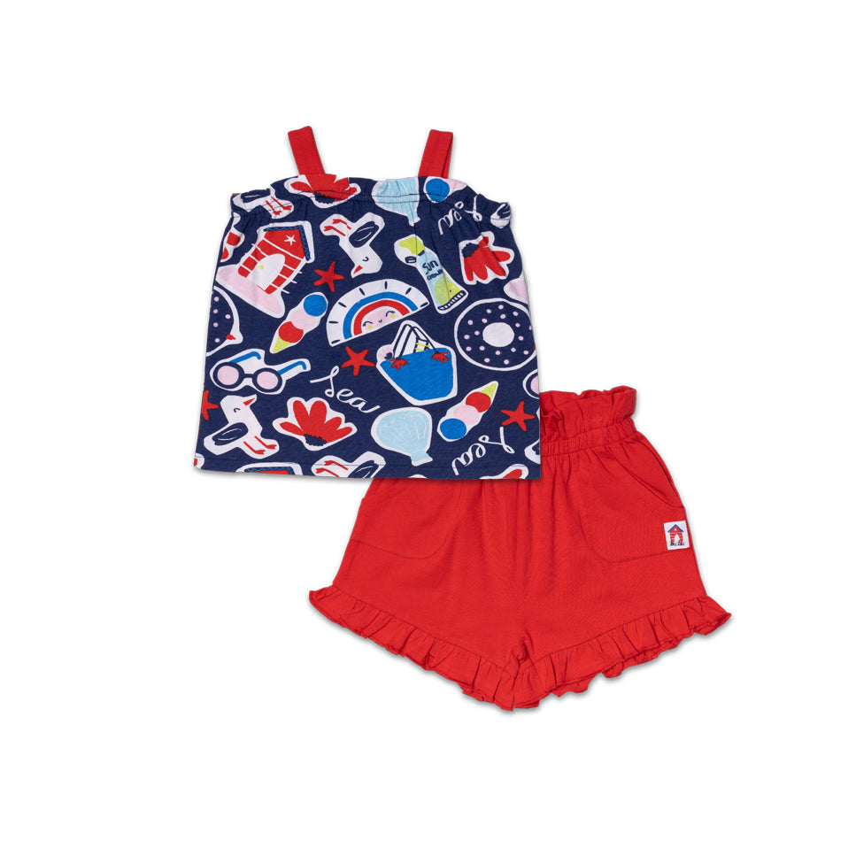 Complete beachwear from the Tuc Tuc Girls' Clothing Line, featuring a patterned top and solid col...