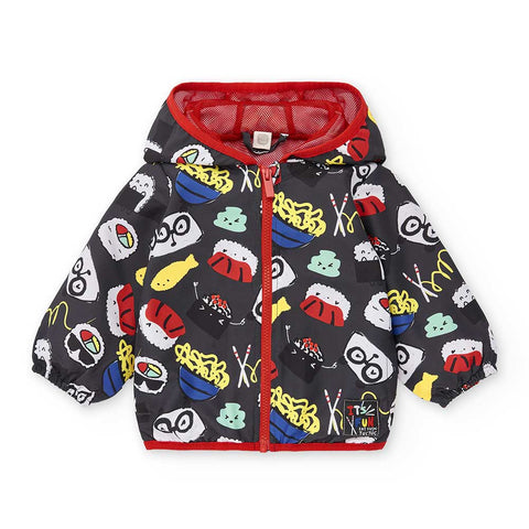 Giacca a vento per bambini con cappuccio e fantasie colorate.