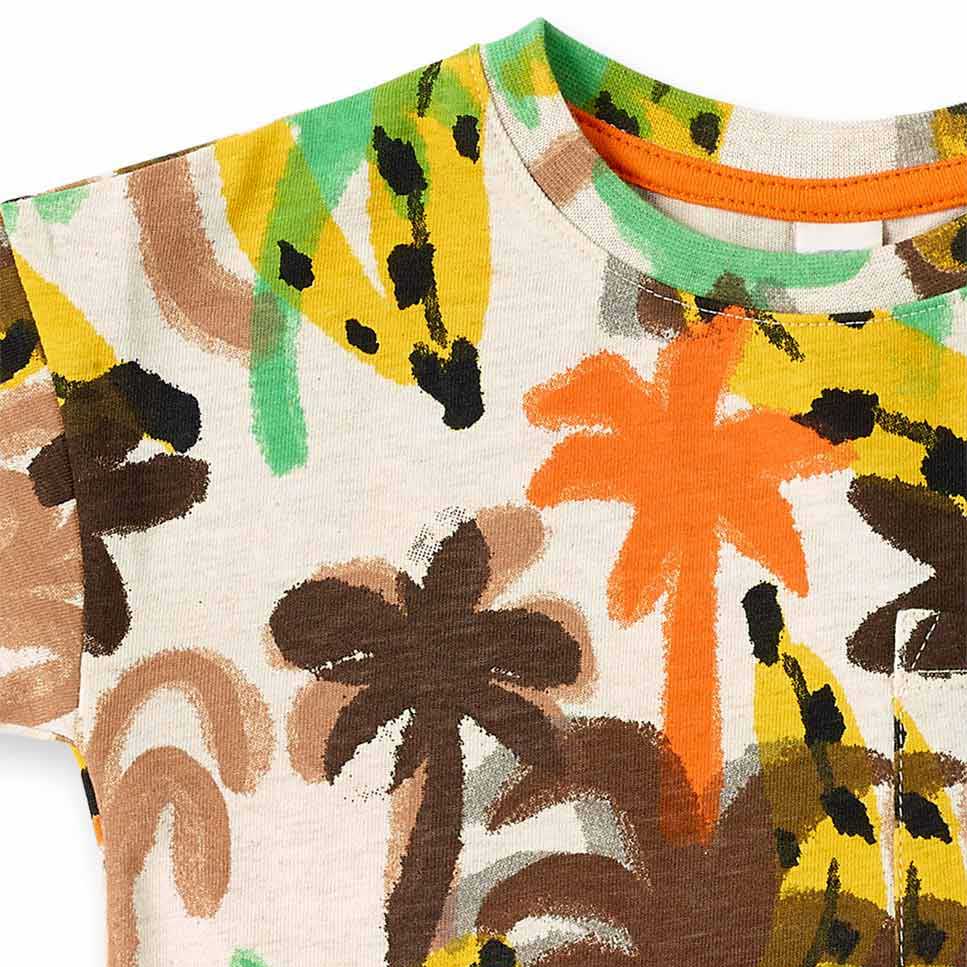 T-shirt from the tuc tuc Children's Clothing Line, with a front pocket, snap buttons on one shoul...