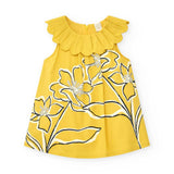 Abito giallo da bambina con colletto ampio e stampa floreale.