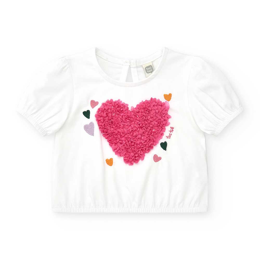 Tuc Tuc Girls' Clothing Line T-shirt, with small petal appliqués on the front forming a heart.
Co...