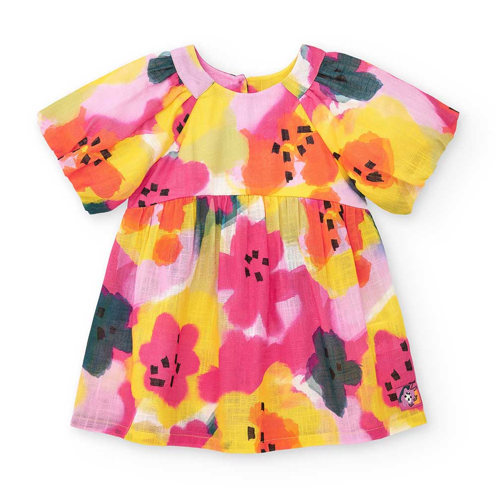 Little dress in fabric from the Tuc Tuc Clothing Line for Girls, with a loose fit and wide neckli...