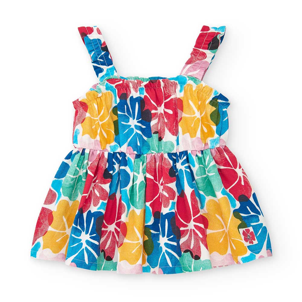 Little dress from the Tuc Tuc Girls' Clothing Line, with an all-over multicolor hibiscus pattern....