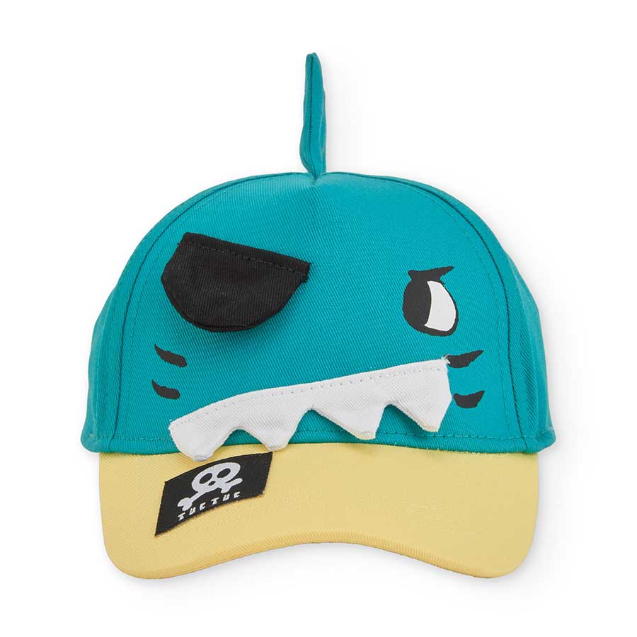 Tuc Tuc Children's Clothing Line Cap, with a visor and fabric fins applied to the top.
Compositio...