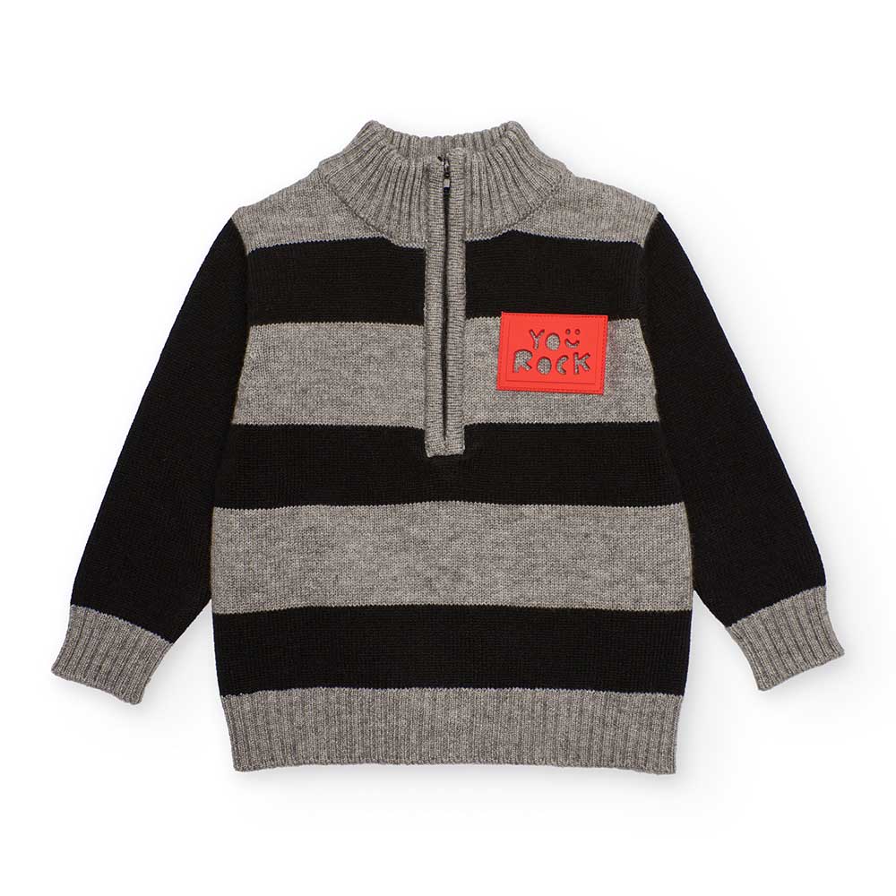 Sweater from the Children's Clothing Line Tuc Tuc, with a half collar with zipper. Pattern of lar...