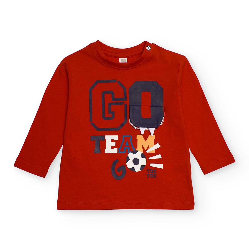 Long sleeve shirt from the Tuc Tuc Children's Clothing Line, with a print on the front.
Compositi...