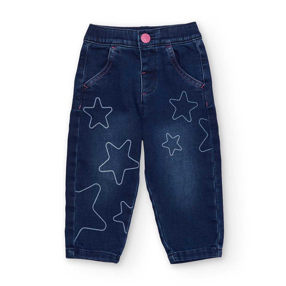 Denim pants from the Girls' Clothing Line tuc Tuc, with a balloon cut and a star pattern in contr...