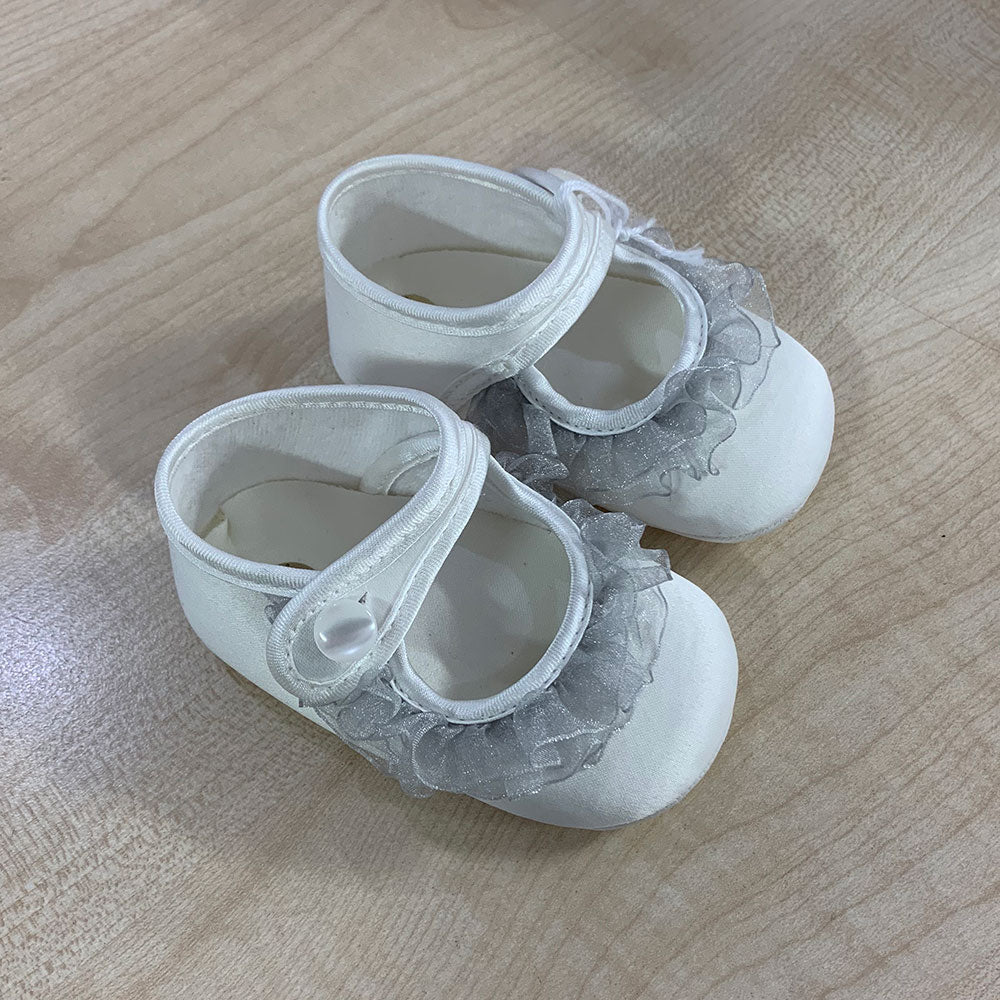 
  Shoes from the Ambarabà children's clothing line, in very soft materials and
  with craftsmans...