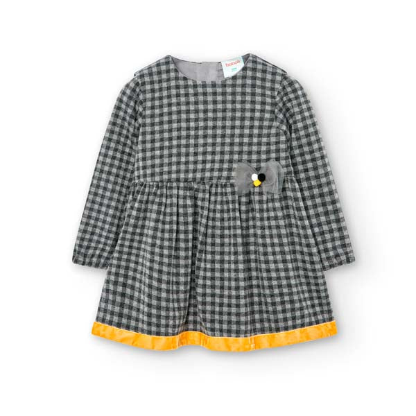 
Checked dress from the Boboli Girls' Clothing Line, with velvet trim on the bottom and buttoning...