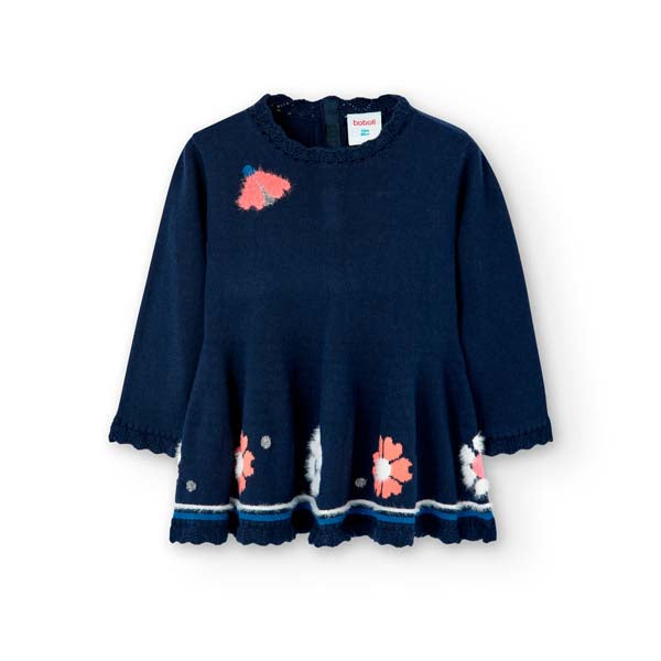 
Knitted dress from the Boboli Girls' Clothing Line, with contrasting colored flowers on the bott...
