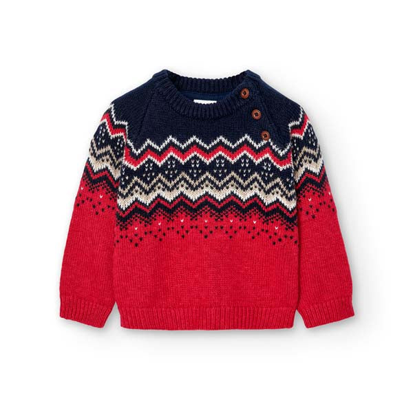 Sweater from the Boboli children's clothing line, with buttons on one side and diamond pattern.

...