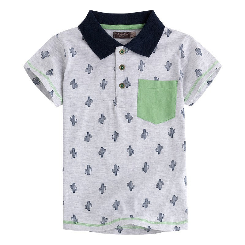 
  Short-sleeved polo shirt from the Canada House children's clothing line, in grey.
  Small cact...
