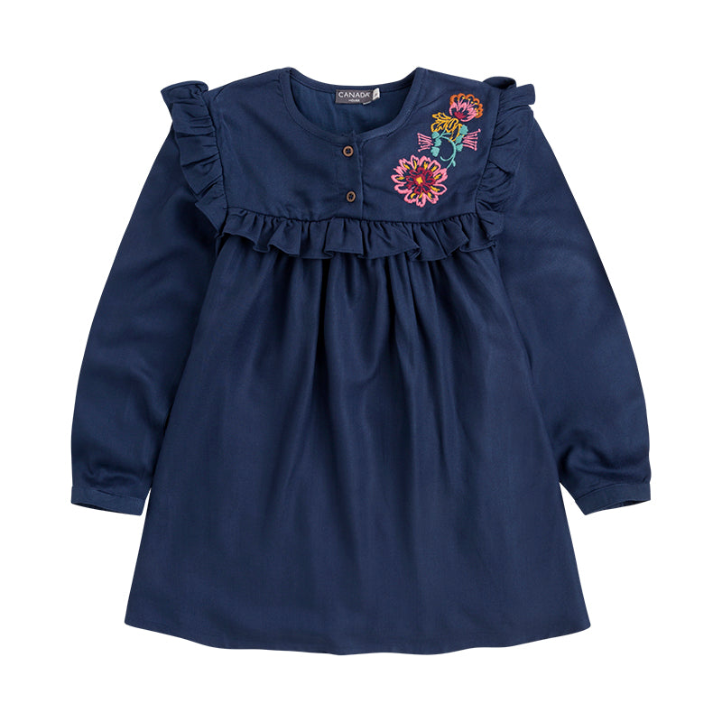 
  Canada House Girl's Clothing line dress with embroidery on one side and application
  of curls...