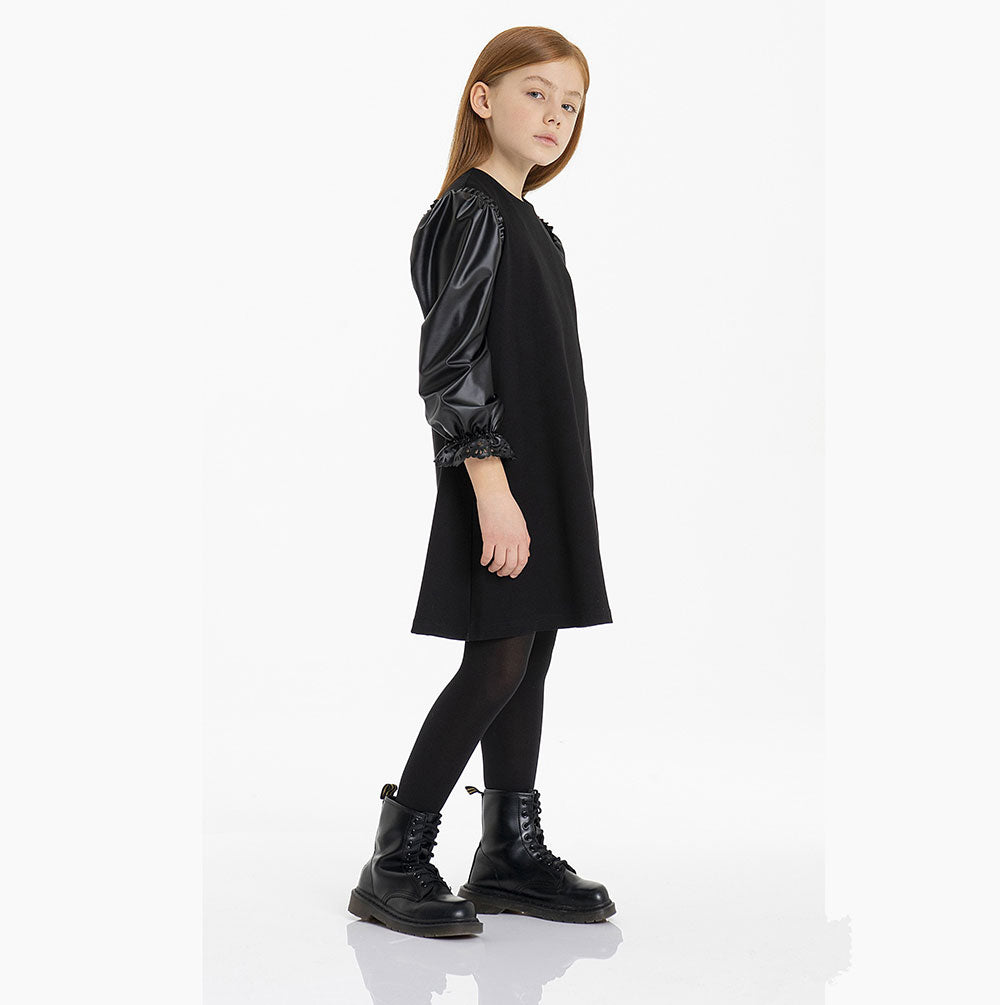 
  Dress from the fracomina Mini girl's clothing line, with mannequins in eco-leather,
  perforat...
