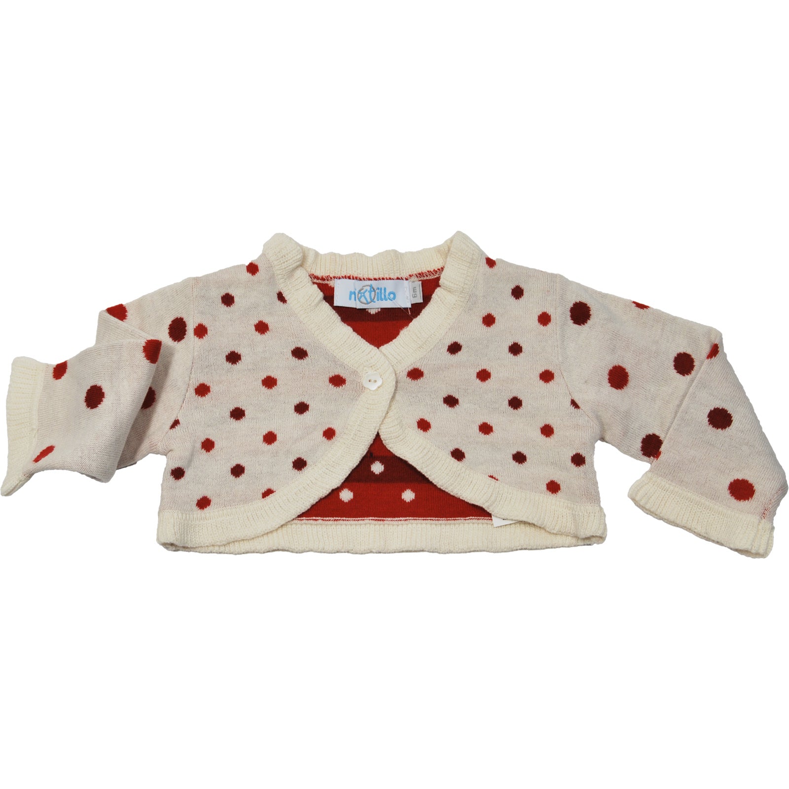 
  Heart warmer from the polka-dot Mirtillo girl's clothing line. 


  80% cotton - 20% wool. 
