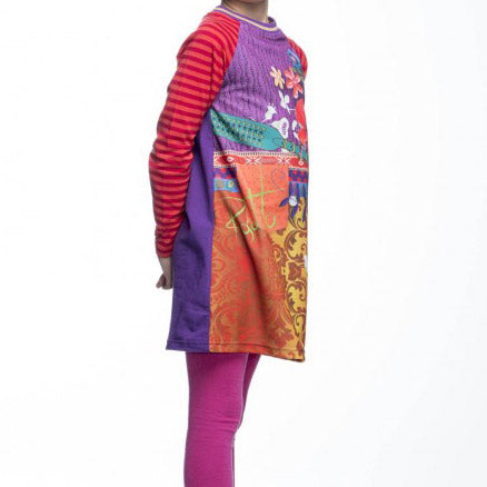 
  Dress of the Rosalita Senoritas girl's clothing line with lively multicolored pattern
  on the...