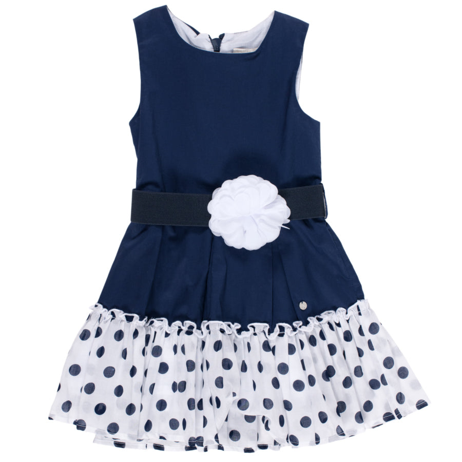 
  Little dress from the Silvian Heach Kids clothing line; blue polka dot fabric
  on a white bac...