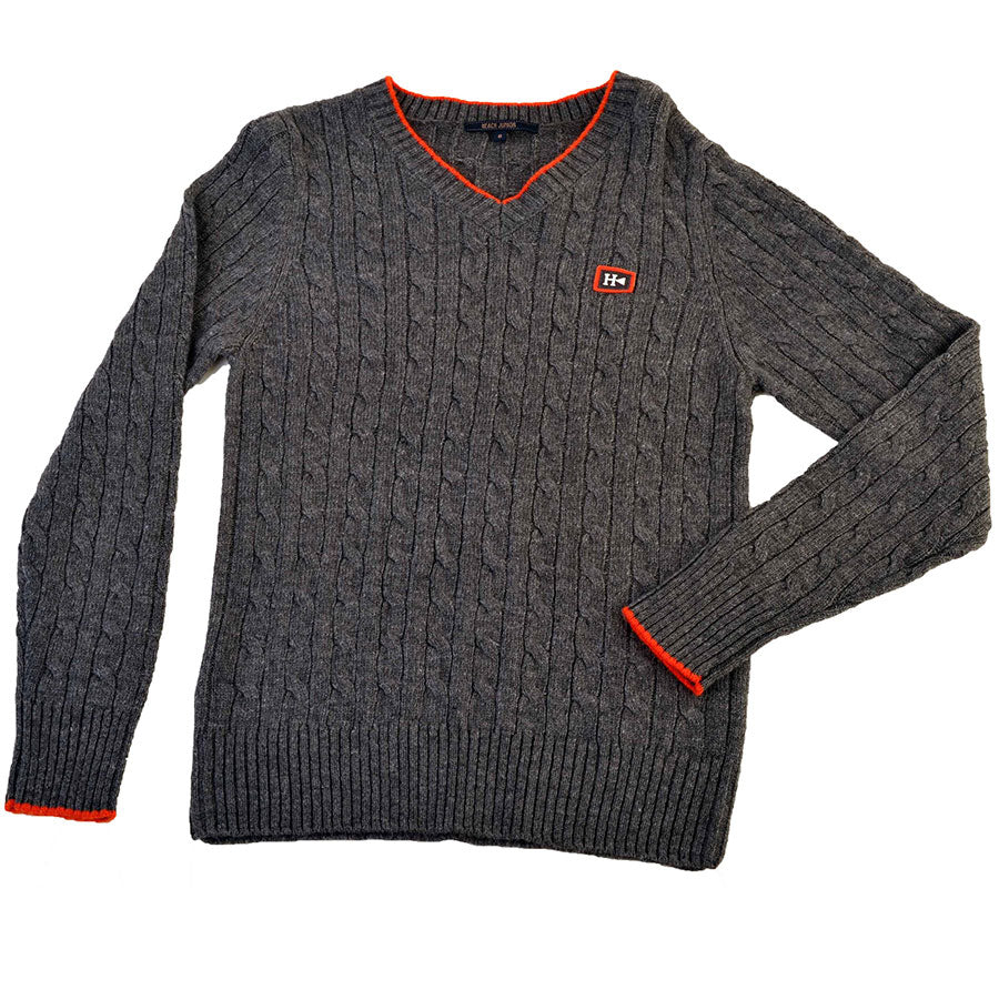 
  Sweater from the Silvian Heach Kids clothing line with braided weaving, v-neck and orange trim...