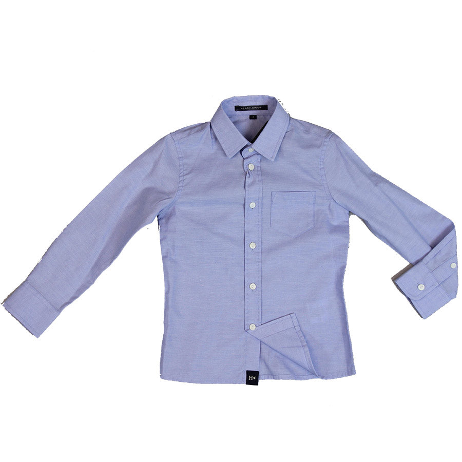 Shirt from the children's clothing line Silvian Heach. Solid colour with front pocket.

Compositi...