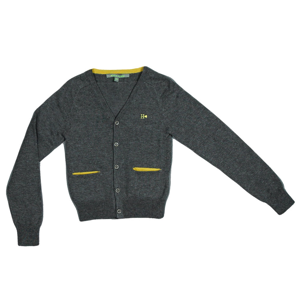 Cardigan from the Silvian Heach Junior children's clothing line, solid colour with pockets on the...