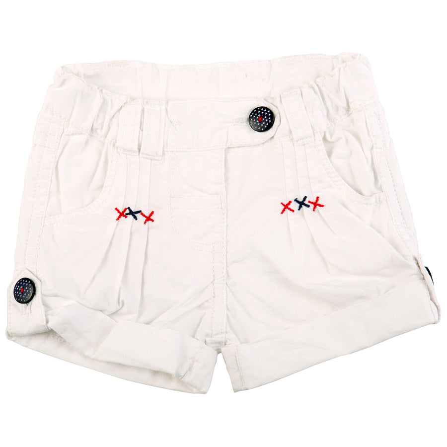 
  Beautiful shorts from the Tuc Tuc girl's clothing line with little pockets and
  dangles on th...
