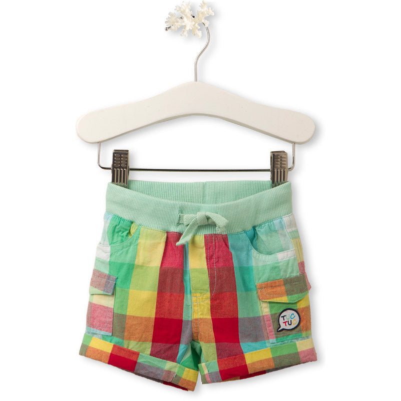 
  Shorts from the Tuc Tuc children's clothing line, with beautiful checked pattern on
  green bo...