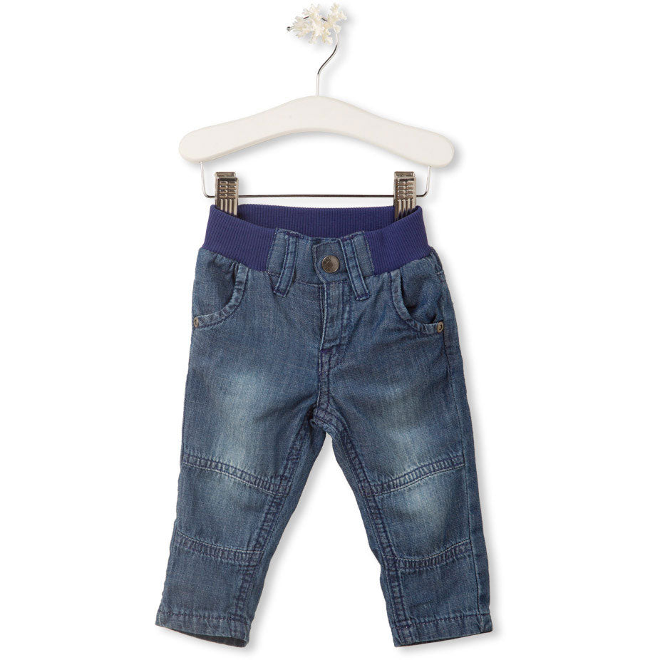 
  Basic jeans of the children's clothing line Tuc Tuc, with regular and soft cut
  with seams on...