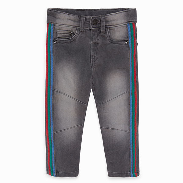 
  Denim trousers from the Tuc Tuc girl's clothing line, with dark bottom and stripes
  colored o...